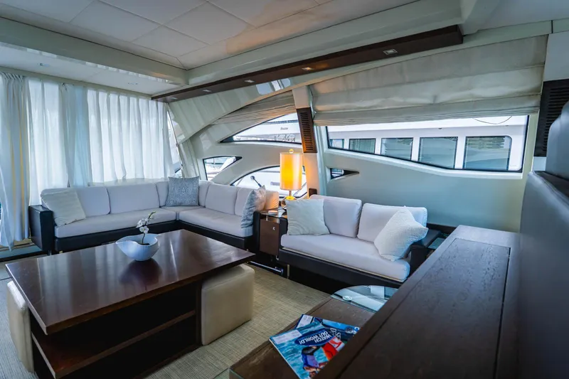 Slide: The Image of Luxurious interior of 2010 Azimut 86S yacht with modern seating and elegant decor. - 18
