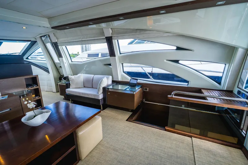 Slide: The Image of Luxurious interior of 2010 Azimut 86S yacht with modern furnishings and large windows. - 19
