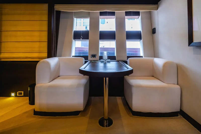Slide: The Image of Luxurious interior seating area on a 2010 Azimut 86S yacht with modern design. - 22