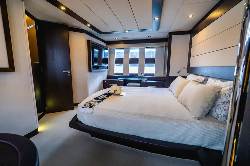 Slide: The Image of Luxurious bedroom interior of 2010 Azimut 86S yacht with modern design and elegant furnishings. - 23