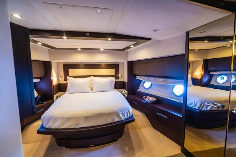 Slide: The Image of Luxurious bedroom interior of 2010 Azimut 86S yacht with modern design and ambient lighting. - 4