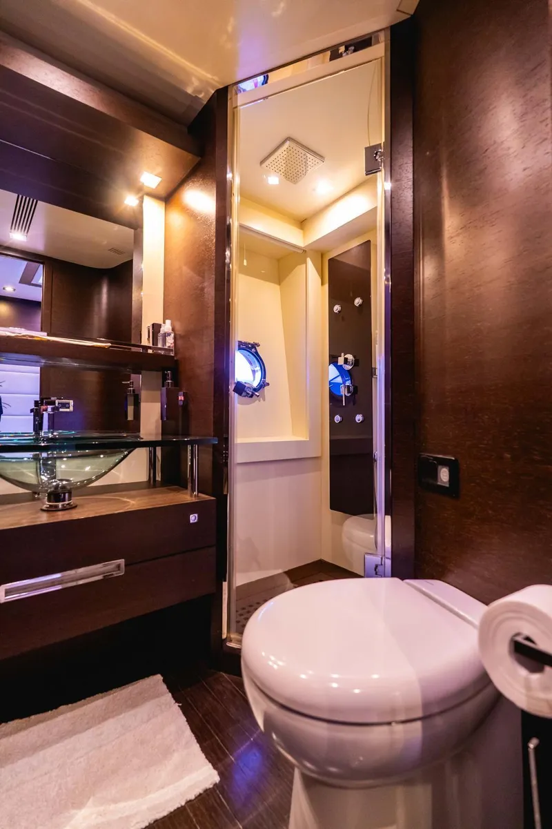 Slide: The Image of Luxurious bathroom in 2010 Azimut 86S yacht with modern fixtures and elegant design. - 9