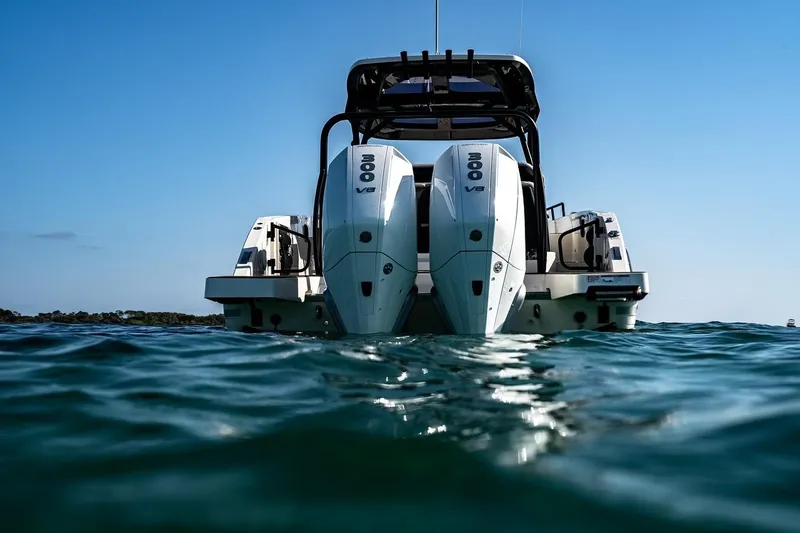 Slide: The Image of Navan S30 2025 boat with dual 300 V8 engines on open water. - 14