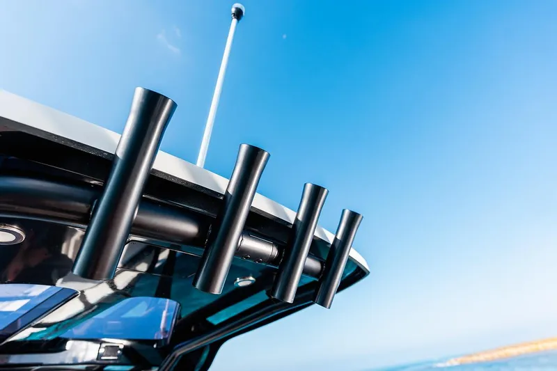 Slide: The Image of Navan S30 boat on clear turquoise water, showcasing luxury deck design, 2025 model. - 26