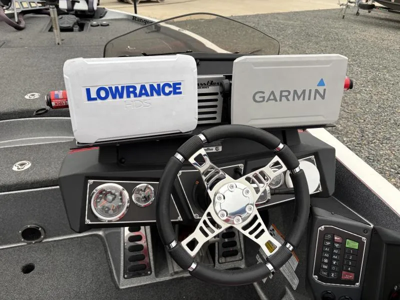 Slide: The Image of 2018 Ranger Z520L boat dashboard with Lowrance and Garmin navigation systems. - 11