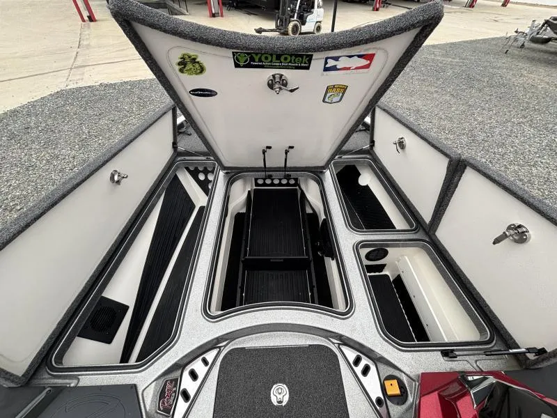 Slide: The Image of 2018 Ranger Z520L boat storage compartments open, showcasing organized interior layout. - 19