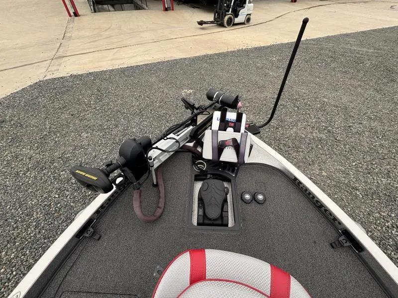 Slide: The Image of 2018 Ranger Z520L boat deck with fishing equipment and controls. - 20