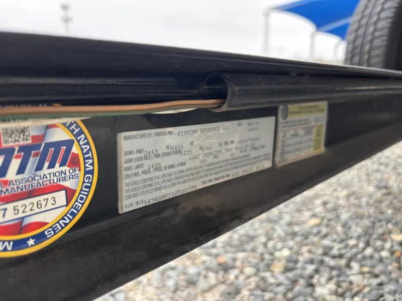 Slide: The Image of Close-up of a 2018 Ranger Z520L trailer label with NATM certification sticker. - 21