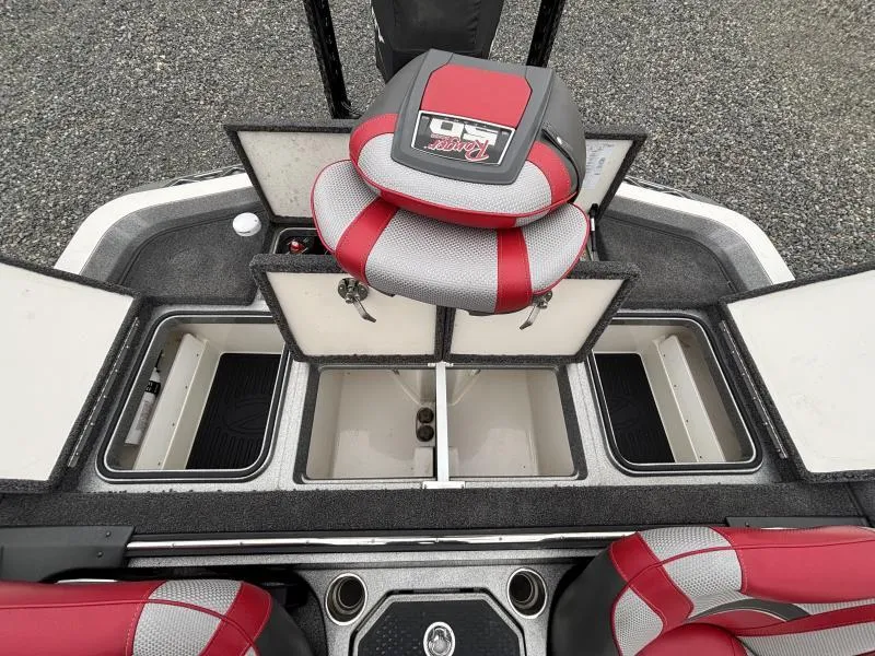 Slide: The Image of 2018 Ranger Z520L boat storage compartments with red and gray seating. - 8