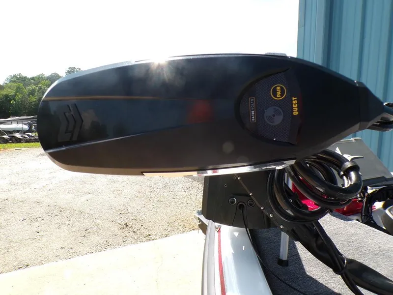 Slide: The Image of Interior storage compartment of 2025 Phoenix 920 Elite boat, featuring sleek red design. - 12