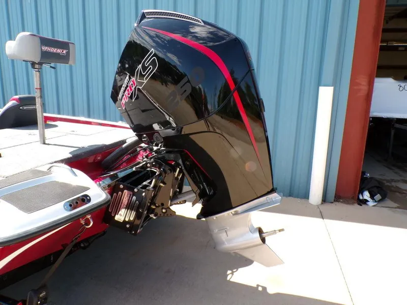 Slide: The Image of Interior compartments of a 2025 Phoenix 920 Elite boat, featuring storage and livewell areas. - 17