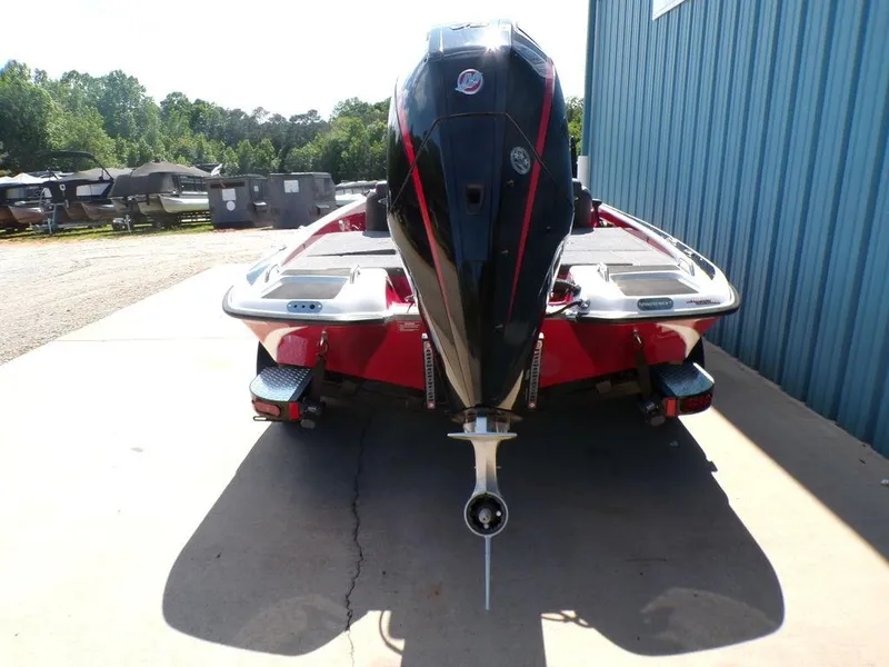 Slide: The Image of 2025 Phoenix 920 Elite boat dashboard with steering wheel and digital display. - 20