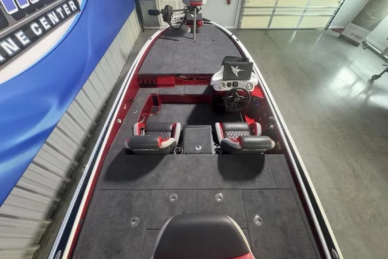 Slide: The Image of 2025 Phoenix 920 Elite boat interior with dual seats and modern dashboard. - 30