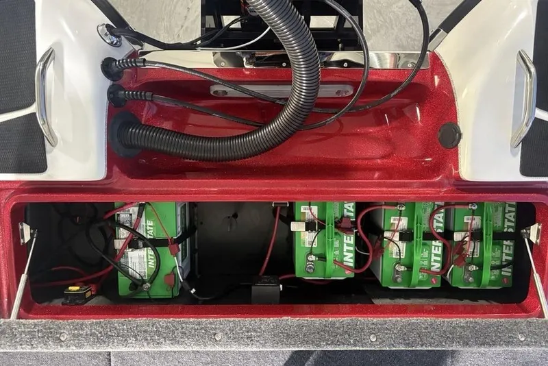 Slide: The Image of Battery compartment of 2025 Phoenix 920 Elite boat with Interstate batteries and wiring. - 31