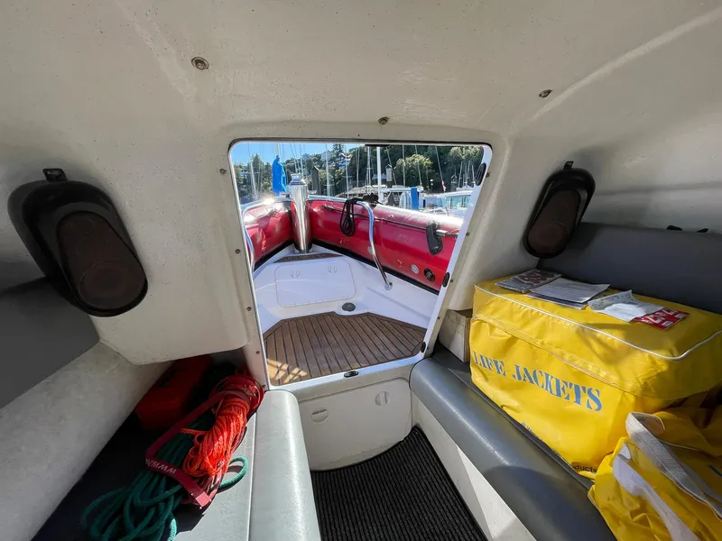 Slide: The Image of Interior view of a 2001 Protector Targa 28 boat with safety equipment. - 26