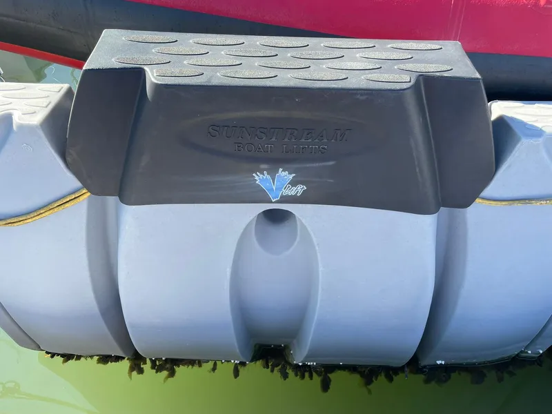 Slide: The Image of 2001 Protector Targa 28 boat lift with Stepstream design, featuring durable construction. - 35