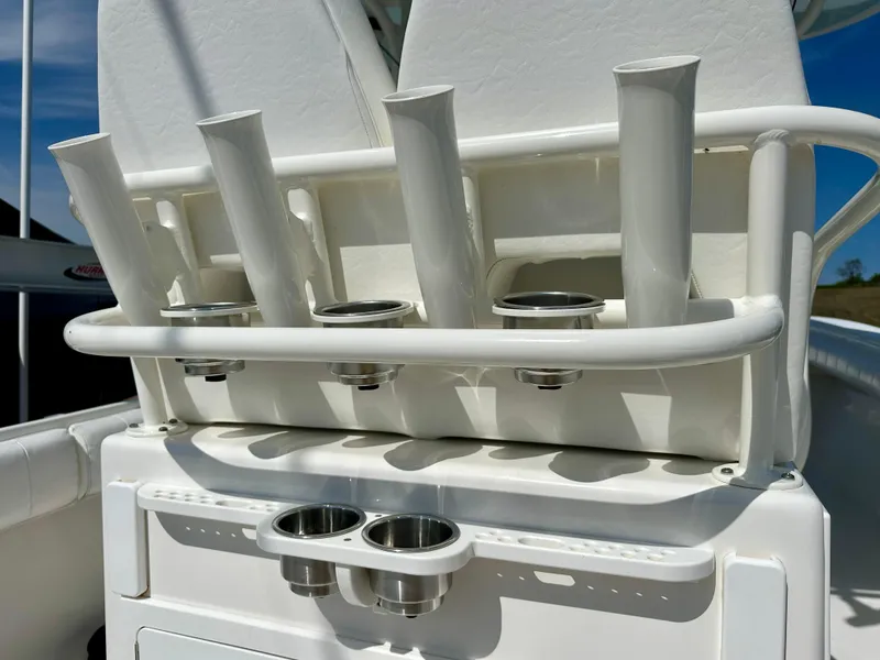 Slide: The Image of 2014 Regulator 28FS boat rod holders and cup holders in white. - 15