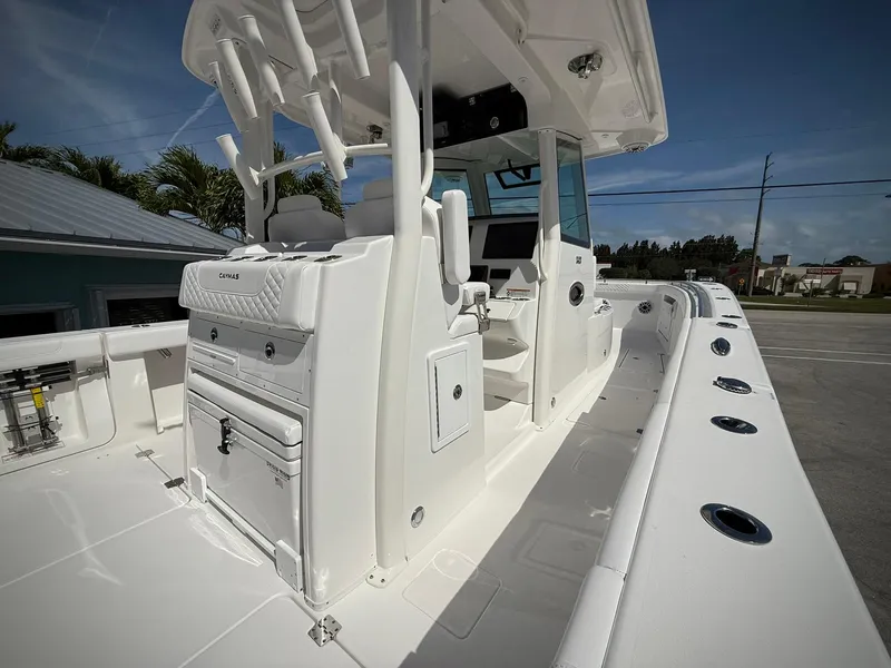 Slide: The Image of 2025 Caymas 34 CT boat interior with sleek white design and modern features. - 9