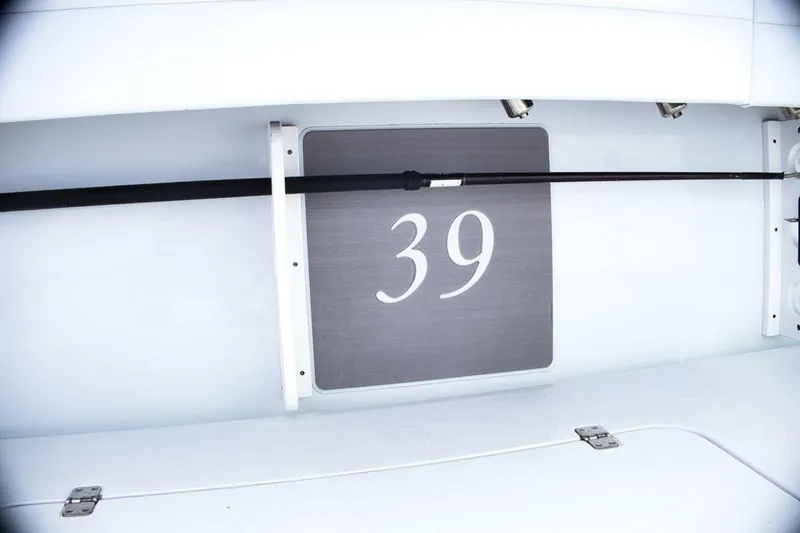 Slide: The Image of 2023 Yellowfin 39 Offshore boat interior detail with number 39 displayed. - 38
