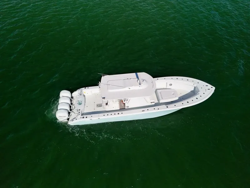 Slide: The Image of 2023 Yellowfin 39 Offshore boat cruising on open water. - 4