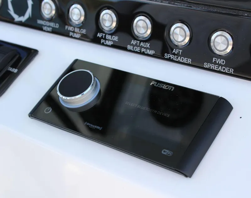 Slide: The Image of Control panel of 2025 Fountain 32 NX boat with Fusion audio system. - 35