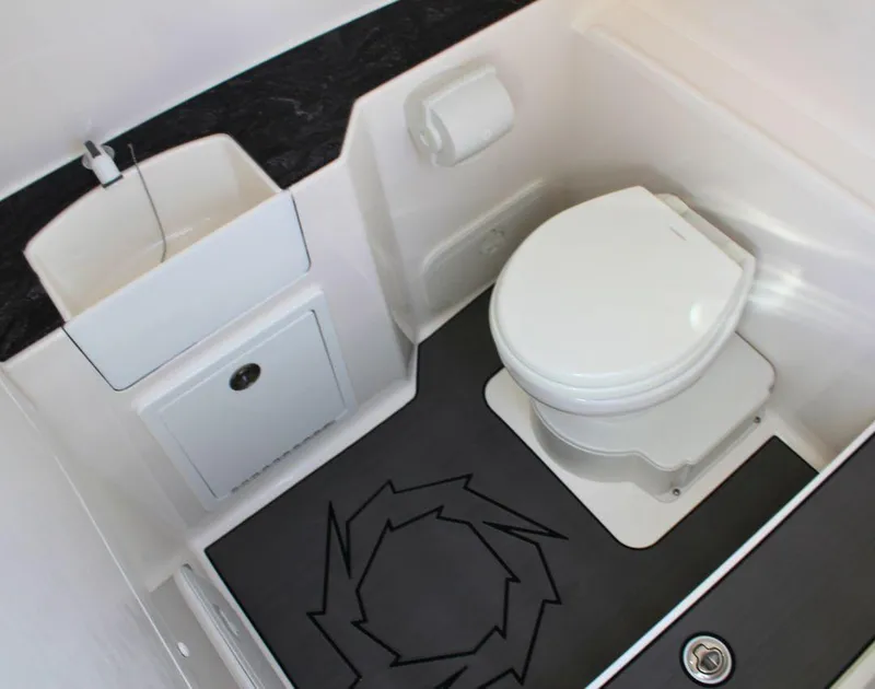 Slide: The Image of 2025 Fountain 38 CC boat bathroom with modern toilet and sink. - 17