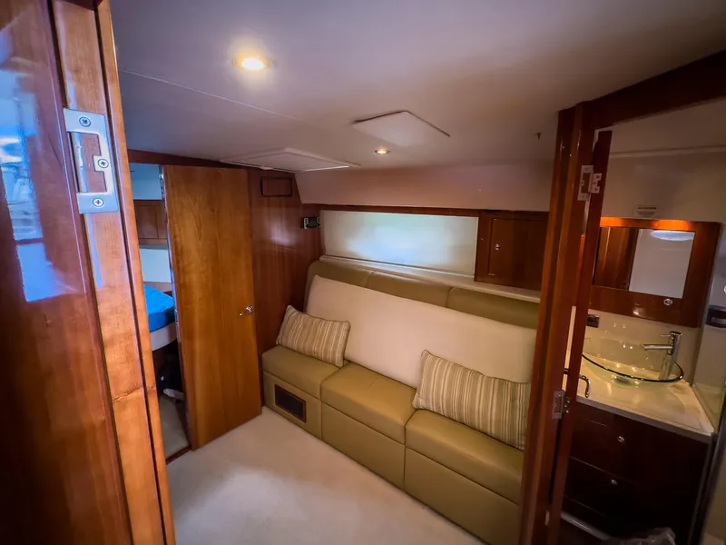 Slide: The Image of Luxurious interior of 2012 Riviera 50SY yacht with sofa and modern bathroom. - 9