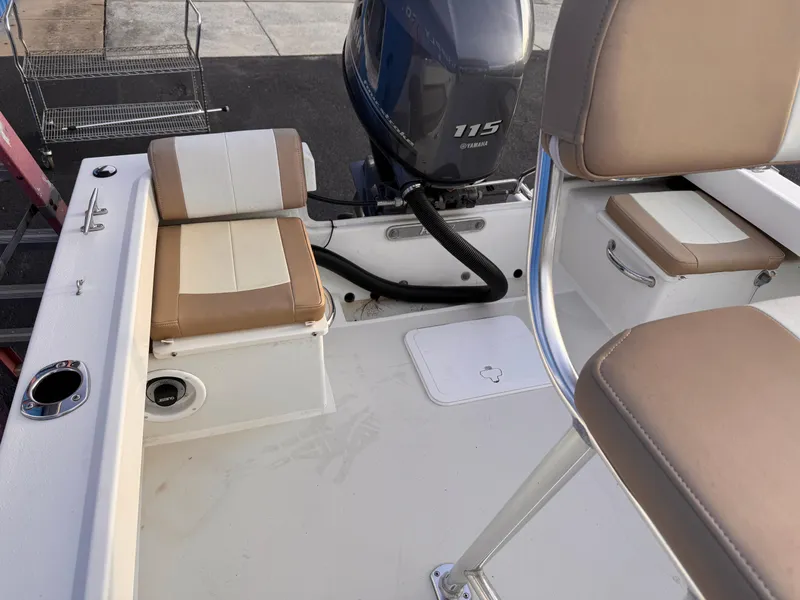 Slide: The Image of 2017 Parker 1801 Center Console boat interior with Yamaha 115 engine. - 11