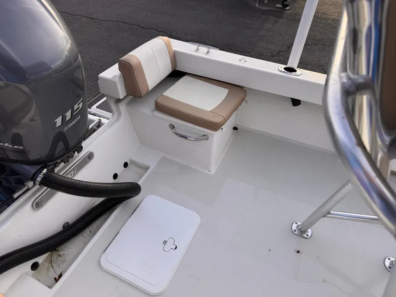 Slide: The Image of 2017 Parker 1801 Center Console boat interior with seating and Yamaha 115 engine. - 12