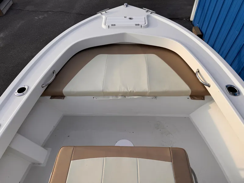 Slide: The Image of 2017 Parker 1801 Center Console boat interior with cushioned seating and storage. - 13