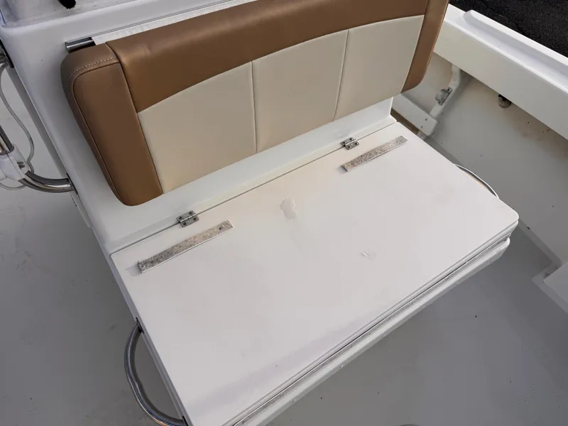 Slide: The Image of 2017 Parker 1801 Center Console boat seat with tan and white upholstery. - 14