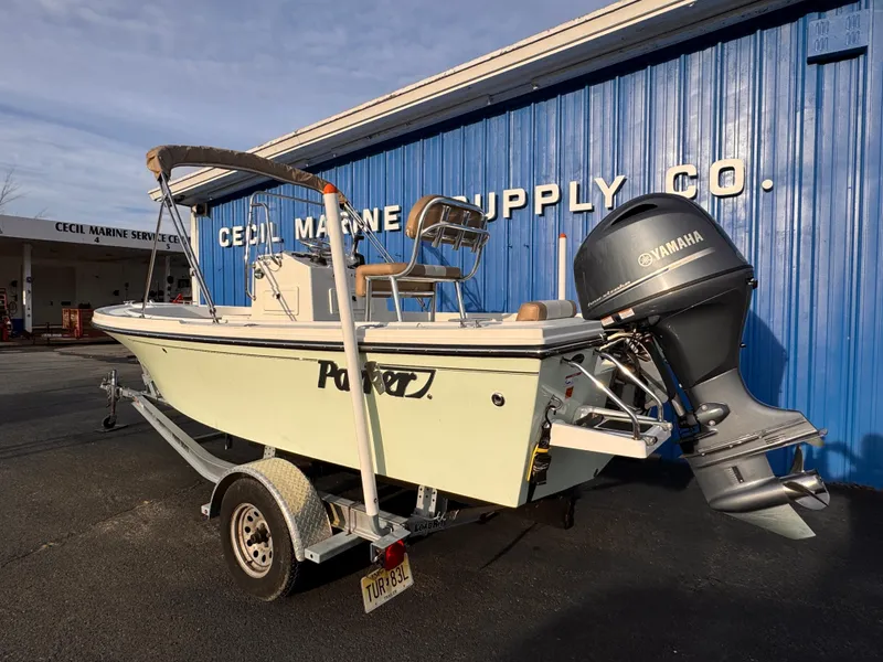 Slide: The Image of 2017 Parker 1801 Center Console boat with Yamaha engine on trailer. - 2