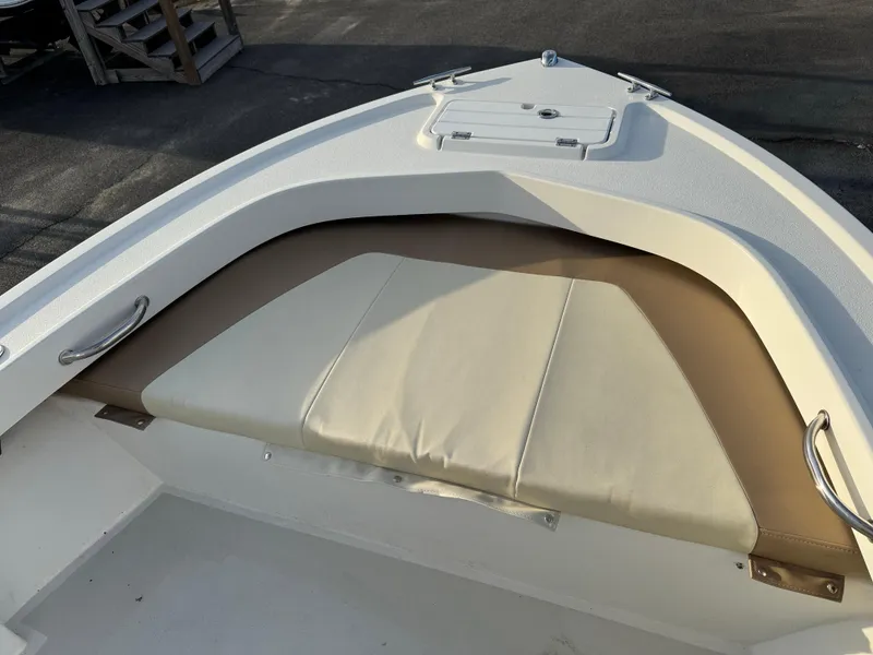 Slide: The Image of 2017 Parker 1801 Center Console boat with cushioned seating and storage hatch. - 23