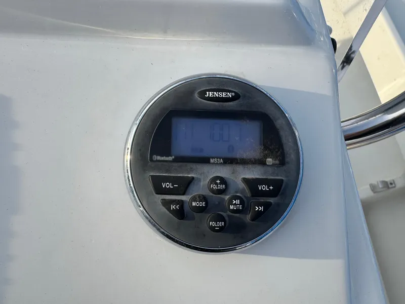 Slide: The Image of Jensen stereo system on 2017 Parker 1801 Center Console boat dashboard. - 30
