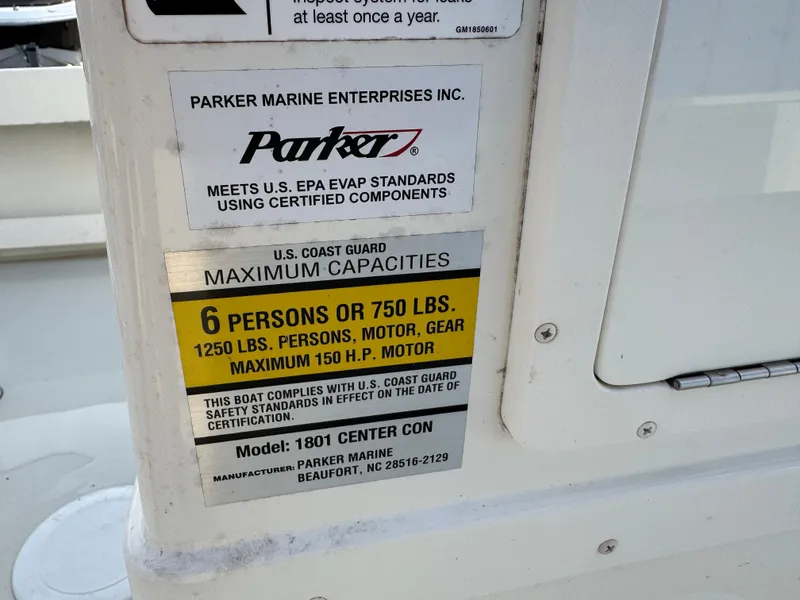 Slide: The Image of 2017 Parker 1801 Center Console capacity label, 6 persons or 750 lbs, 150 HP motor. - 7