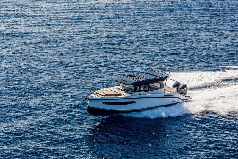 Slide: The Image of Navan C30 2025 boat cruising on deep blue ocean waters. - 17