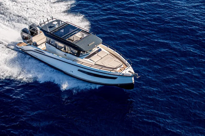 Slide: The Image of Aerial view of 2025 Navan C30 yacht on clear turquoise water. - 18