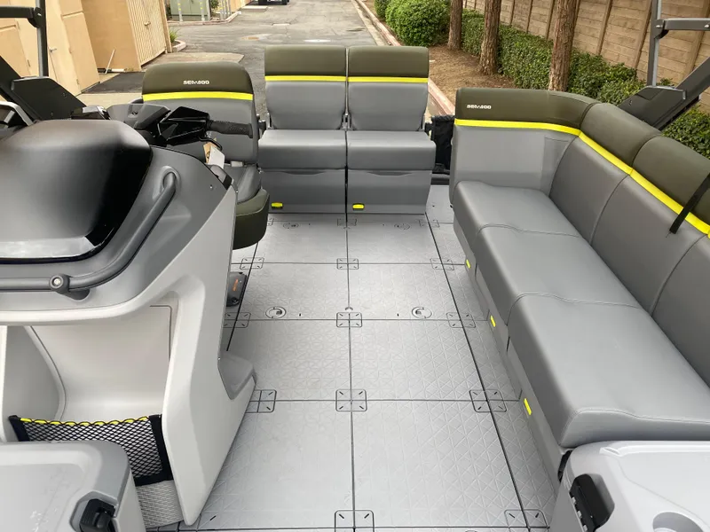 Slide: The Image of Interior of 2025 Sea-Doo Switch Fish 18, featuring spacious seating and modern design. - 13