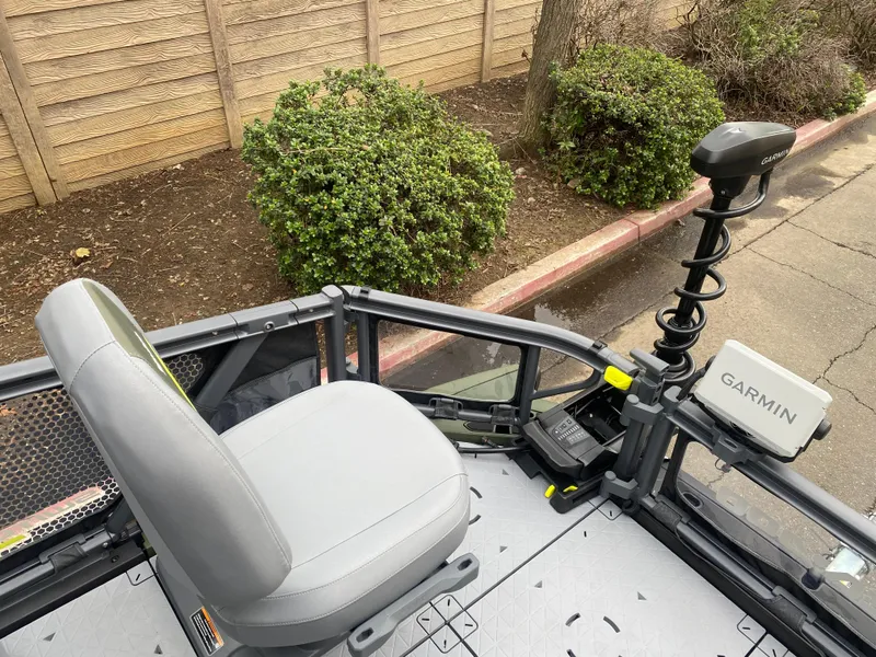 Slide: The Image of 2025 Sea-Doo Switch Fish 18 boat with Garmin navigation system and seating. - 20