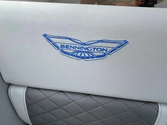 Slide: The Image of Bennington 21L SB 2025 boat seat with embroidered logo and quilted design. - 14