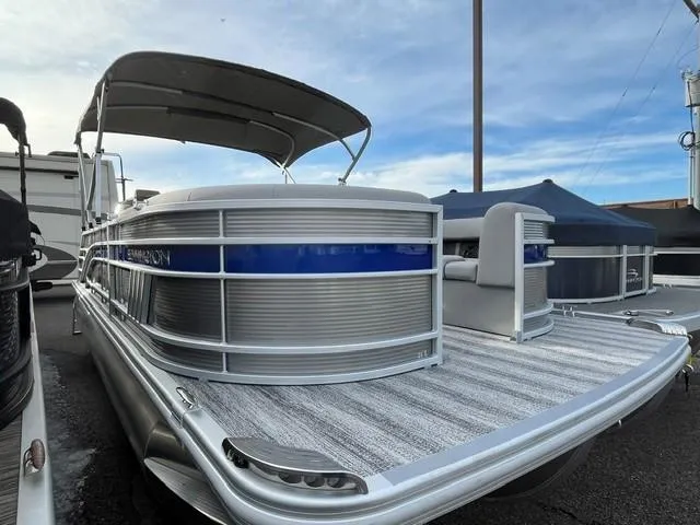 Slide: The Image of 2025 Bennington 21L SB pontoon boat with sleek design and spacious deck. - 4