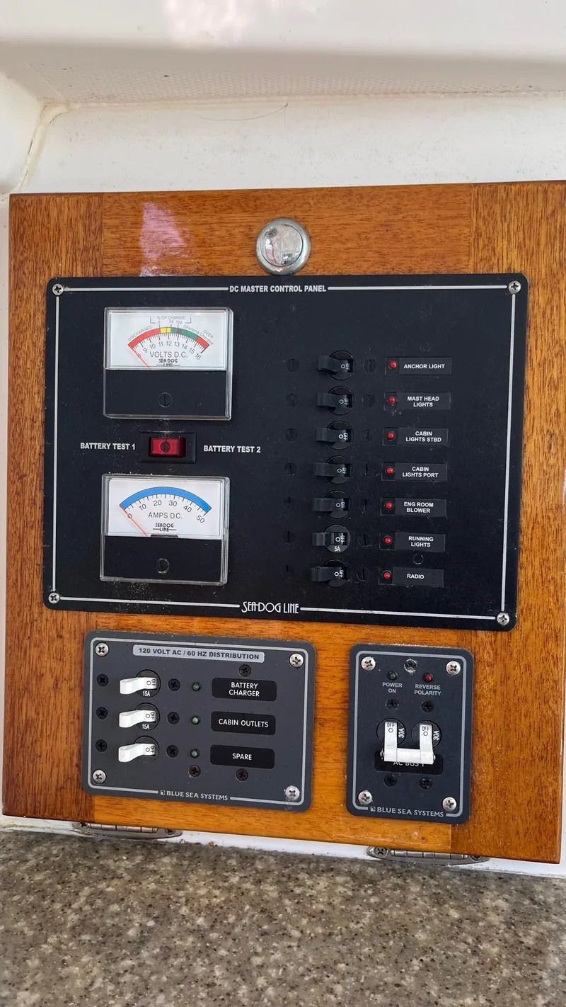 Slide: The Image of Electrical control panel on a 2012 Schock Harbor 25 boat. - 20