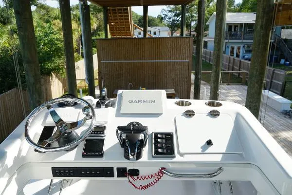 Slide: The Image of Control panel of 2016 Everglades 435CC boat with Garmin navigation system. - 14