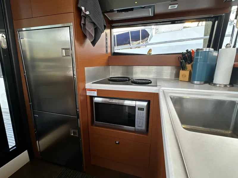 Slide: The Image of Modern kitchen in 2015 Prestige 500 S yacht with stainless steel appliances. - 15