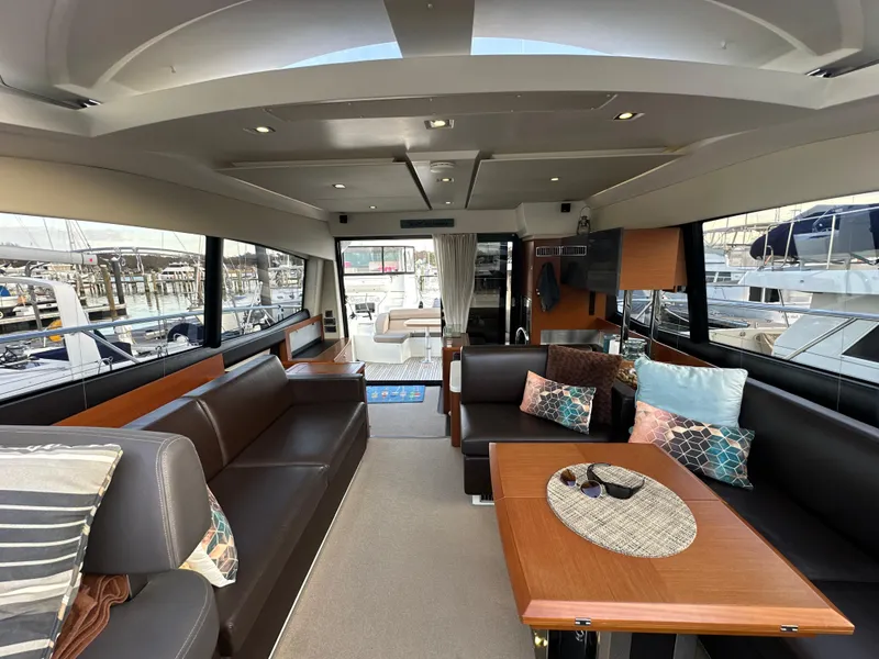 Slide: The Image of Luxurious interior of a 2015 Prestige 500 S yacht with elegant seating and decor. - 17