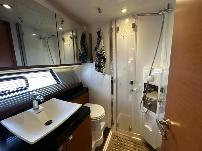 Slide: The Image of Luxurious bathroom in 2015 Prestige 500 S yacht with modern fixtures and shower. - 29