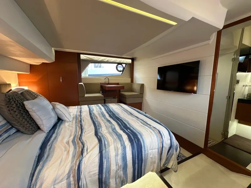 Slide: The Image of Luxurious interior of 2015 Prestige 500 S yacht with cozy bed and modern amenities. - 36