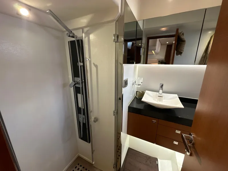Slide: The Image of Luxurious bathroom in 2015 Prestige 500 S yacht with modern shower and sink. - 42