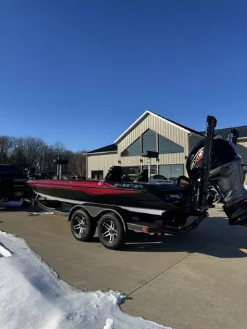 Slide: The Image of 2025 Skeeter ZXR20 boat speeding on a lake, showcasing sleek design and performance. - 1