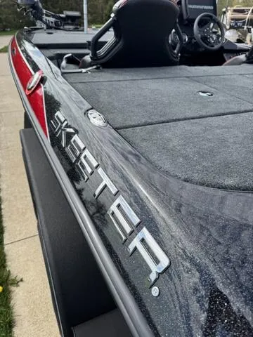 Slide: The Image of 2025 Skeeter ZXR20 boat, sleek design with visible logo and modern features. - 7